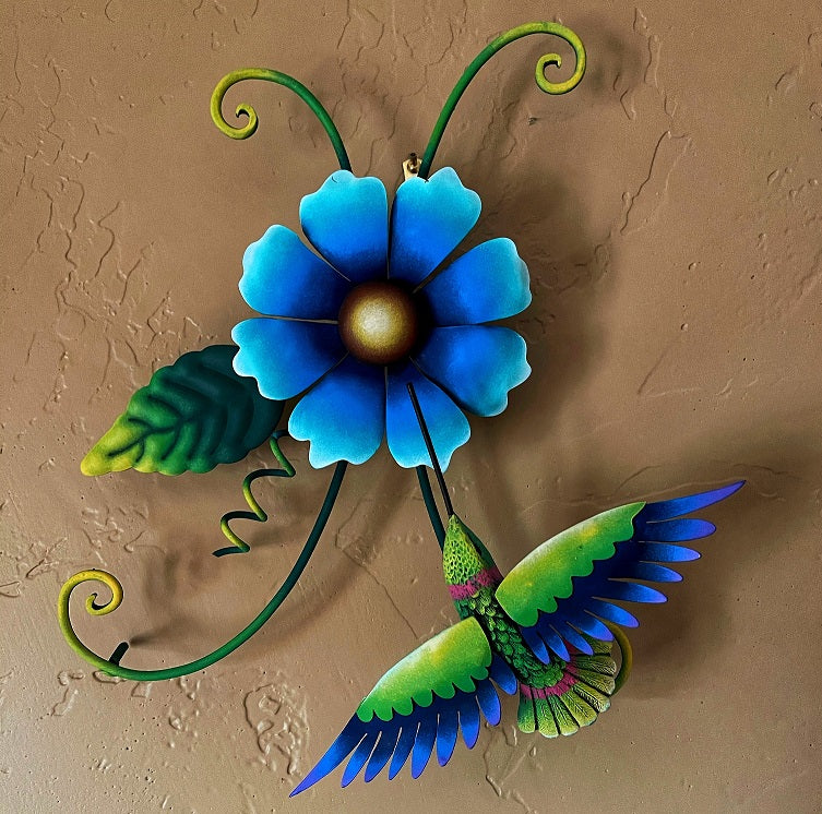 hummingbird with blue flower wall decor