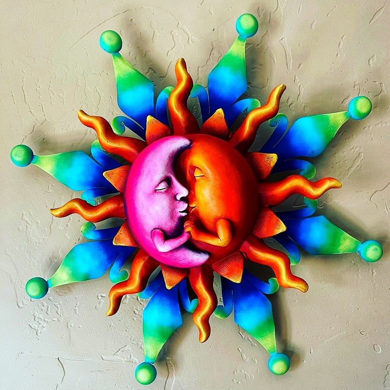 sun and moon holding hands wall decor
