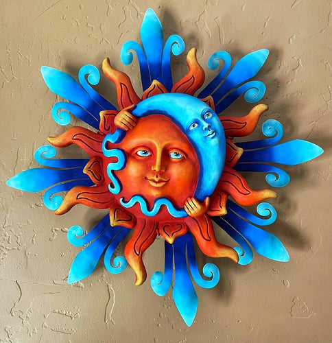 sun holding  blue moon wall decor