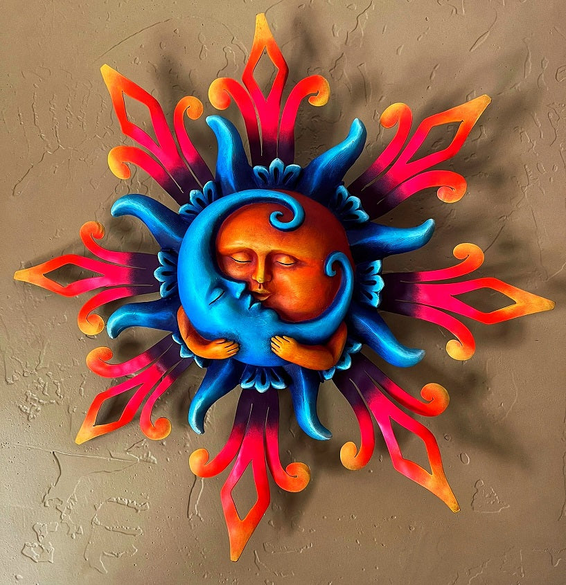 sun holding sleeping moon wall decor